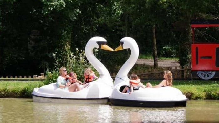 People enjoying the Swan Lake Ride